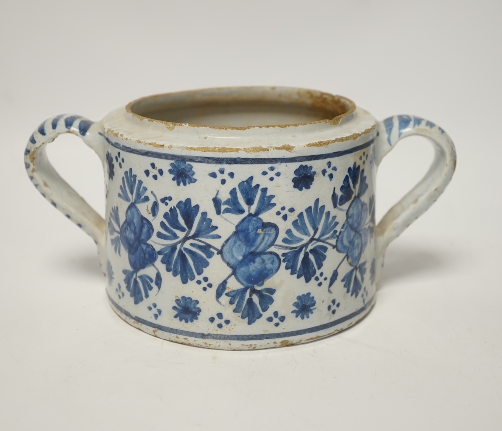 A Delft two handled posset pot, c.1680-1700, 23cm wide including handles